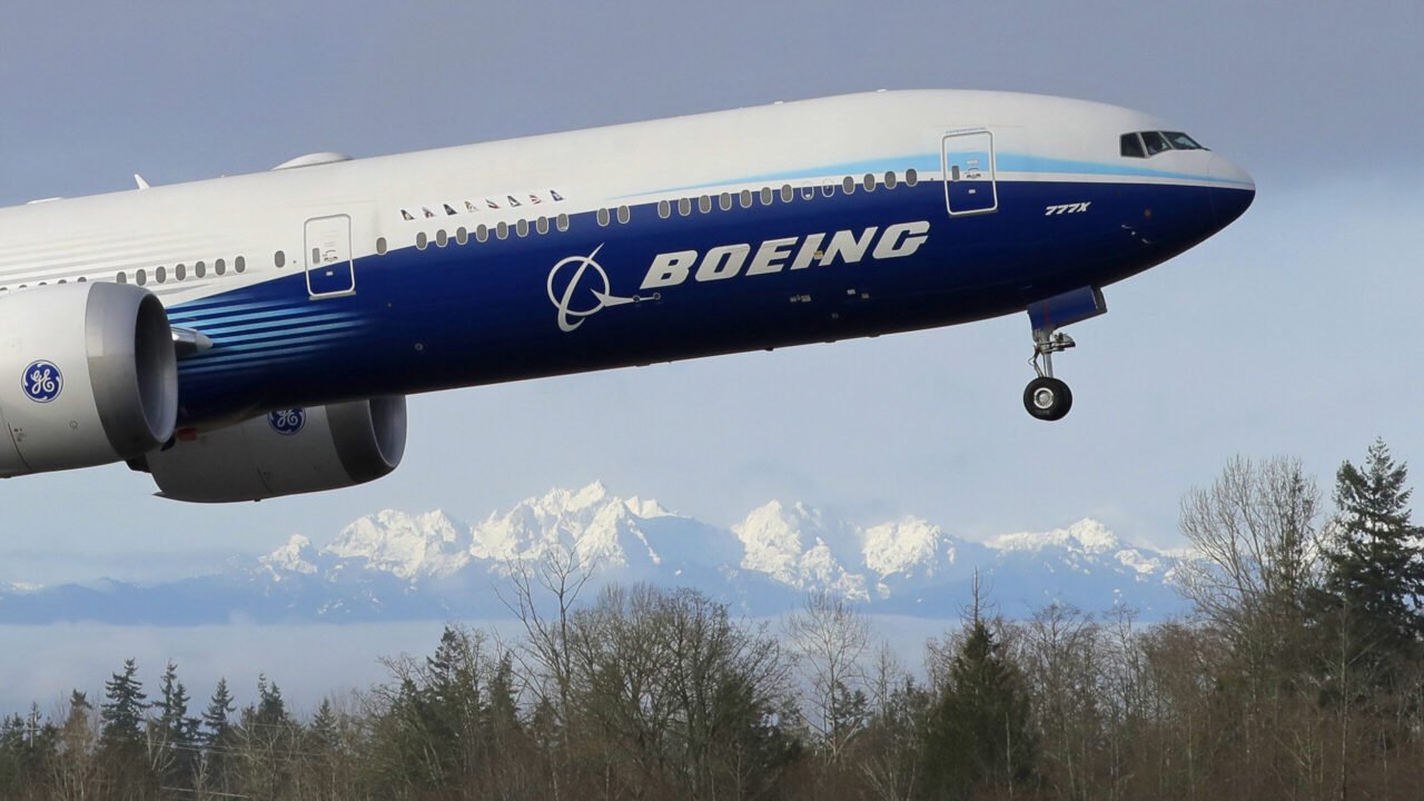 Earns Boeing